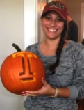 Pumpkin carved with her college logo. (Not a costume)